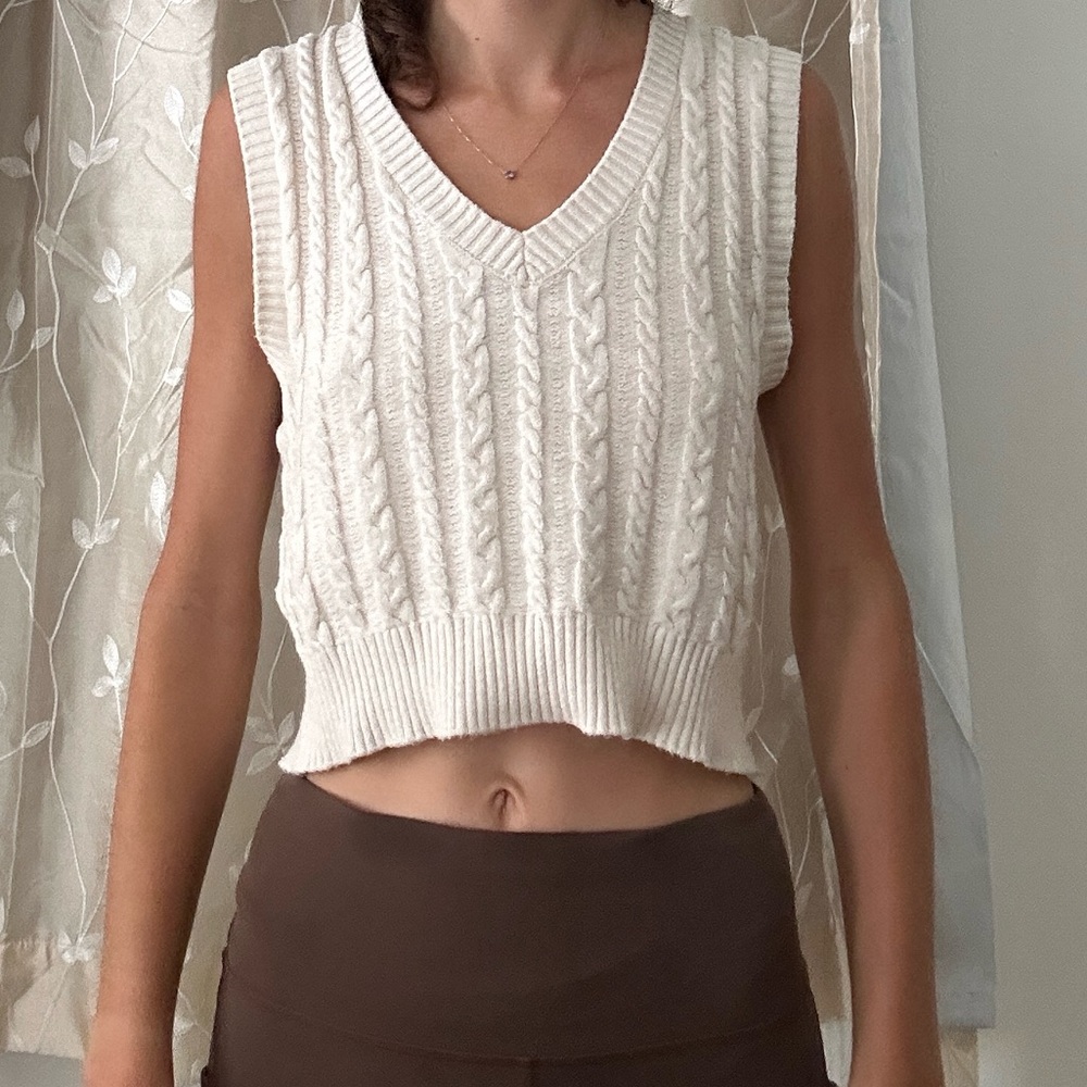 white sweater vest